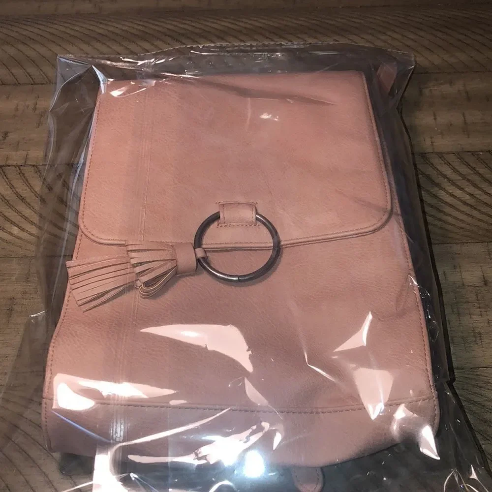 NWOT Pink Ring 💍 & Tassle Vegan Backpack Adjustable Straps. Pull Handle. Snap.
